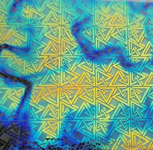 90 Sand Carved Pattern #062 Triangles & Squares, Fusion Cyan Red CBS Dichroic on Green Tint Glass